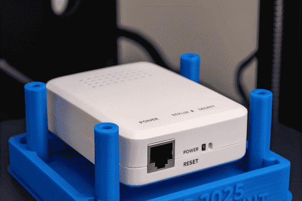 FRC 2025 Radio Mount 3D Print featuring a blue 3D-printed holder securing a white radio device. FRC 2025 Radio Mount 3D Print featuring a blue 3D-printed holder securing a white radio device.